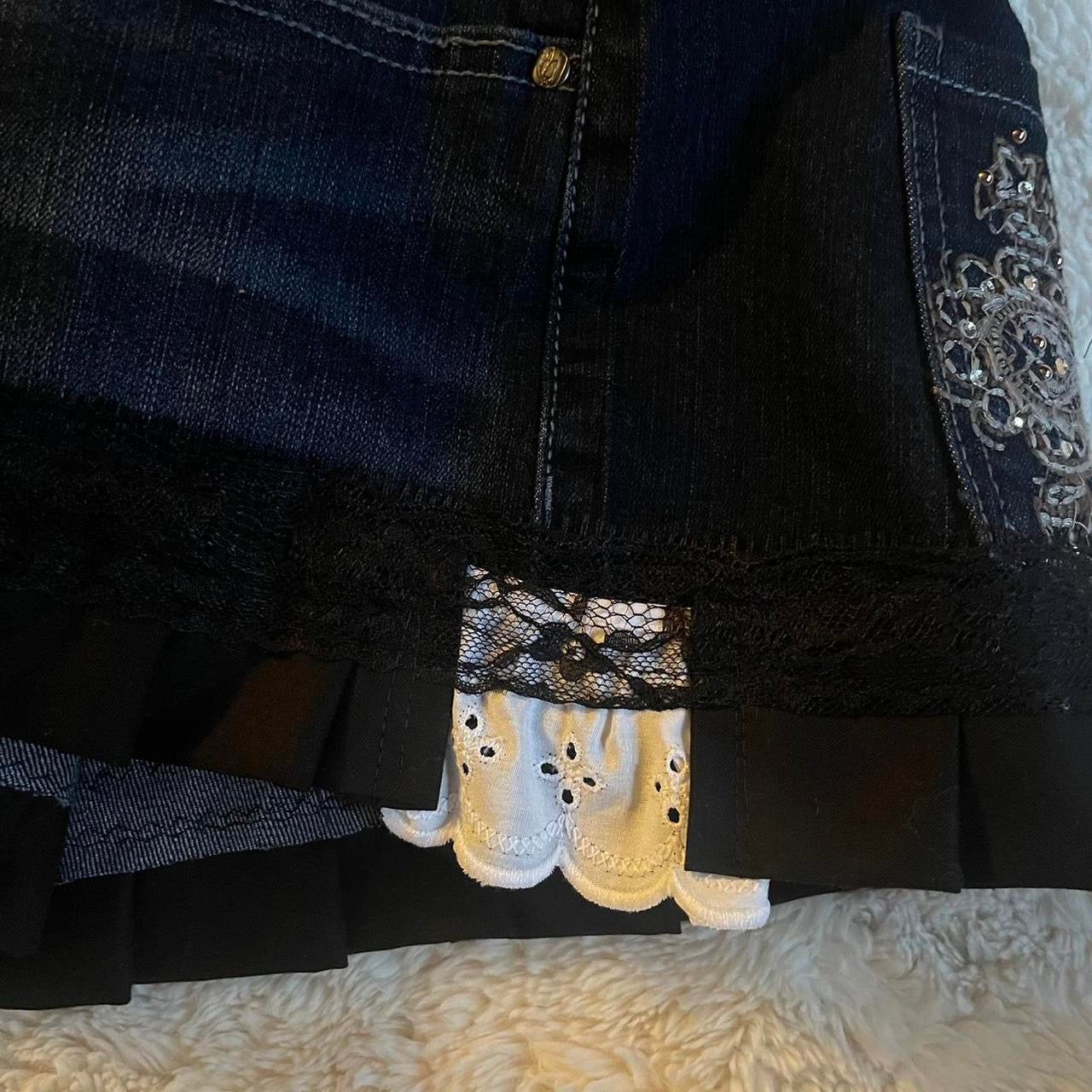 reworked OOAK 2000s princess dark wash denim micro mini skirt w black ribbon, lace and hand sewn pleats ୨୧