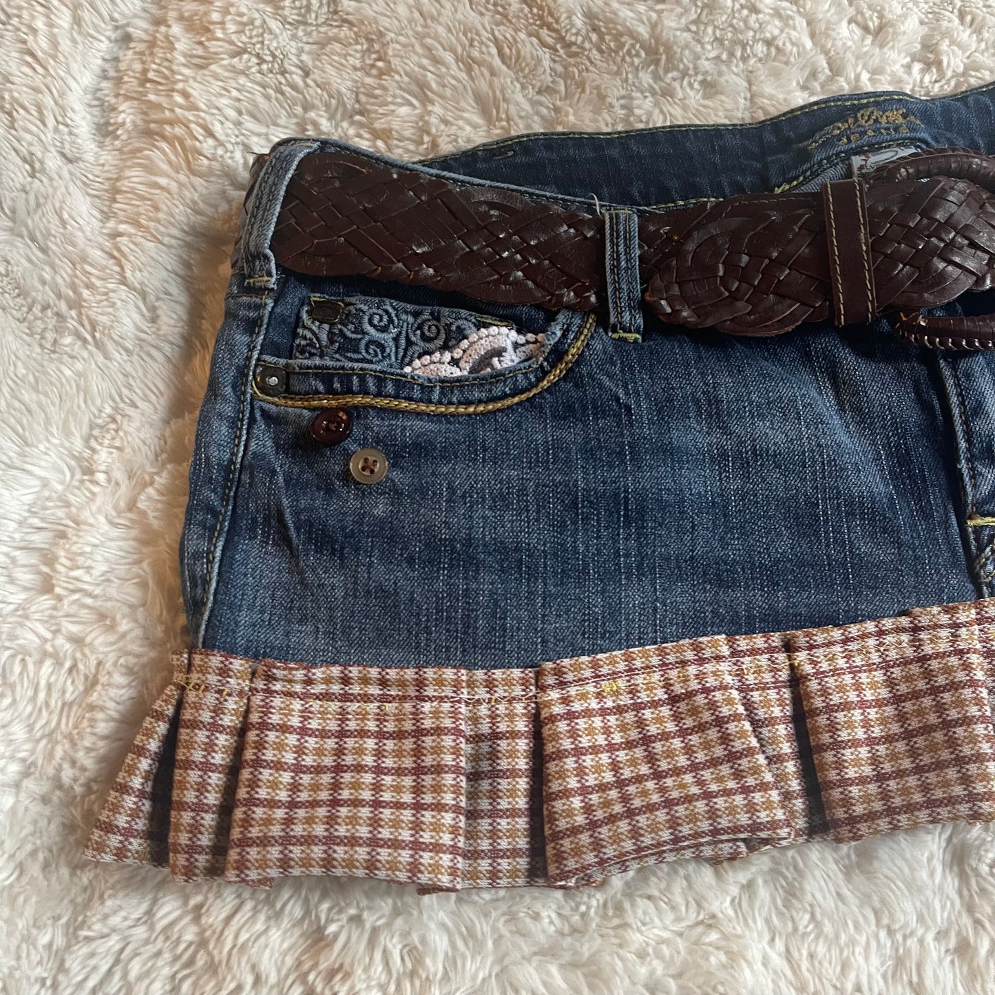 ୨୧ reworked OOAK vintage 70s western princess micro mini denim skirt with pleats, woven belt, buttons and lace trim