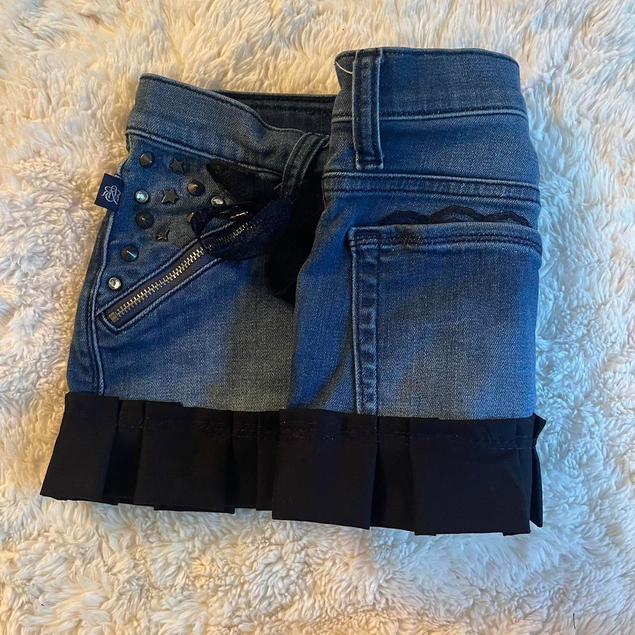 reworked OOAK 2000s princess light wash denim micro mini skirt w rhinestones, spiked studs, zipper pockets, black ribbon, lace and hand sewn pleats ୨୧