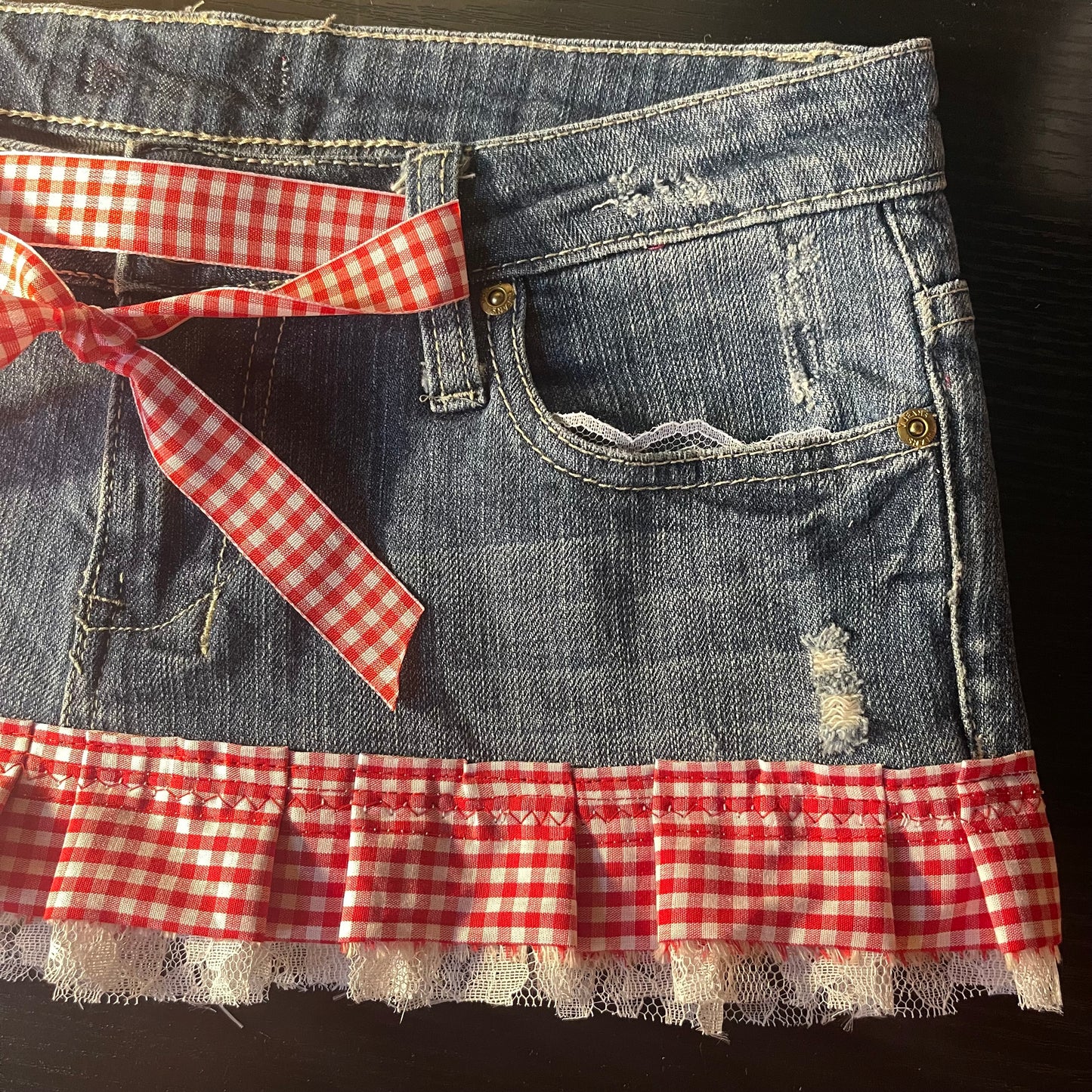 ୨୧ reworked OOAK y2k vintage mini denim skirt with red gingham pleats with lace trim, lace & bows