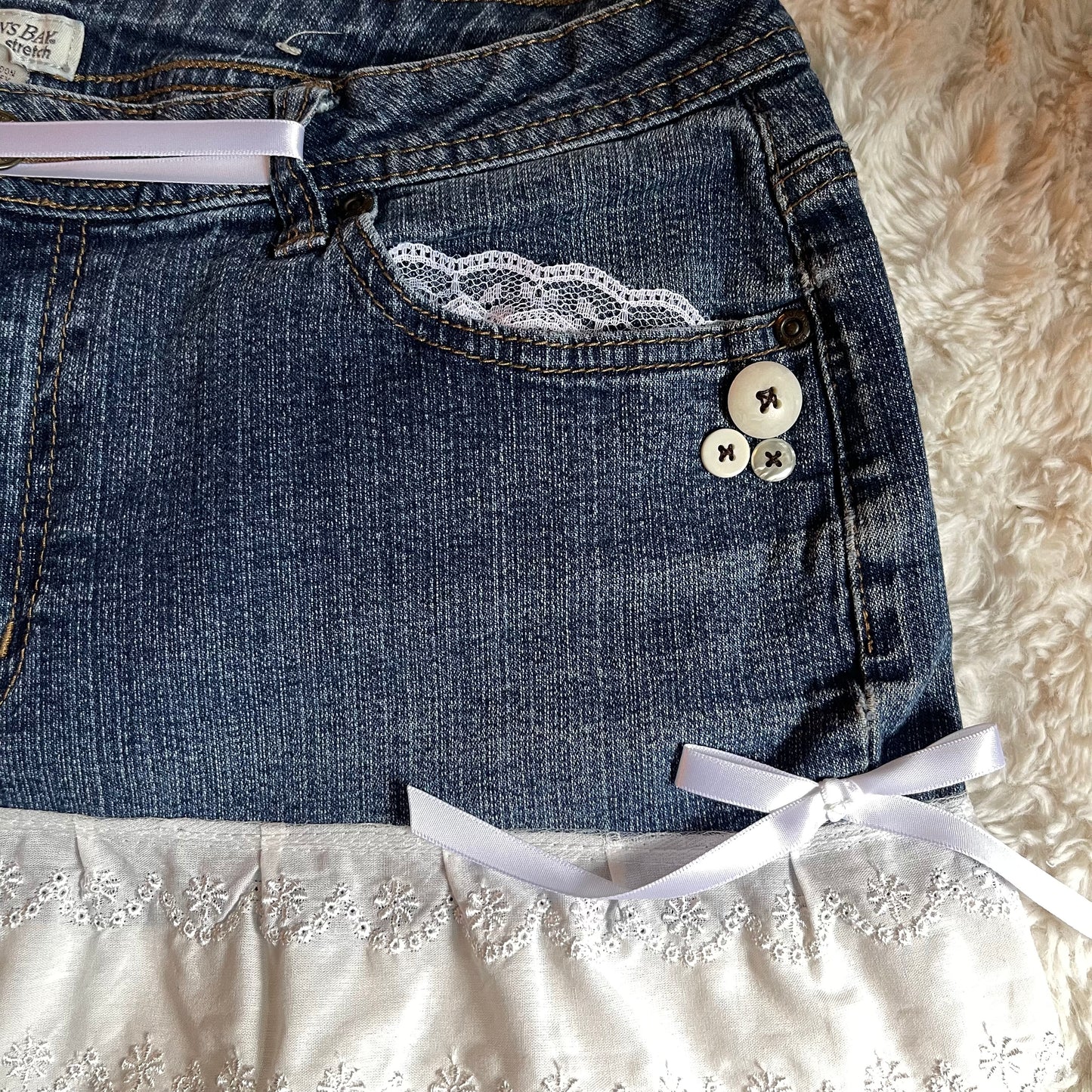 ୨୧ reworked OOAK 2000s extreme denim micro light wash mini skirt with lace trim & white bows