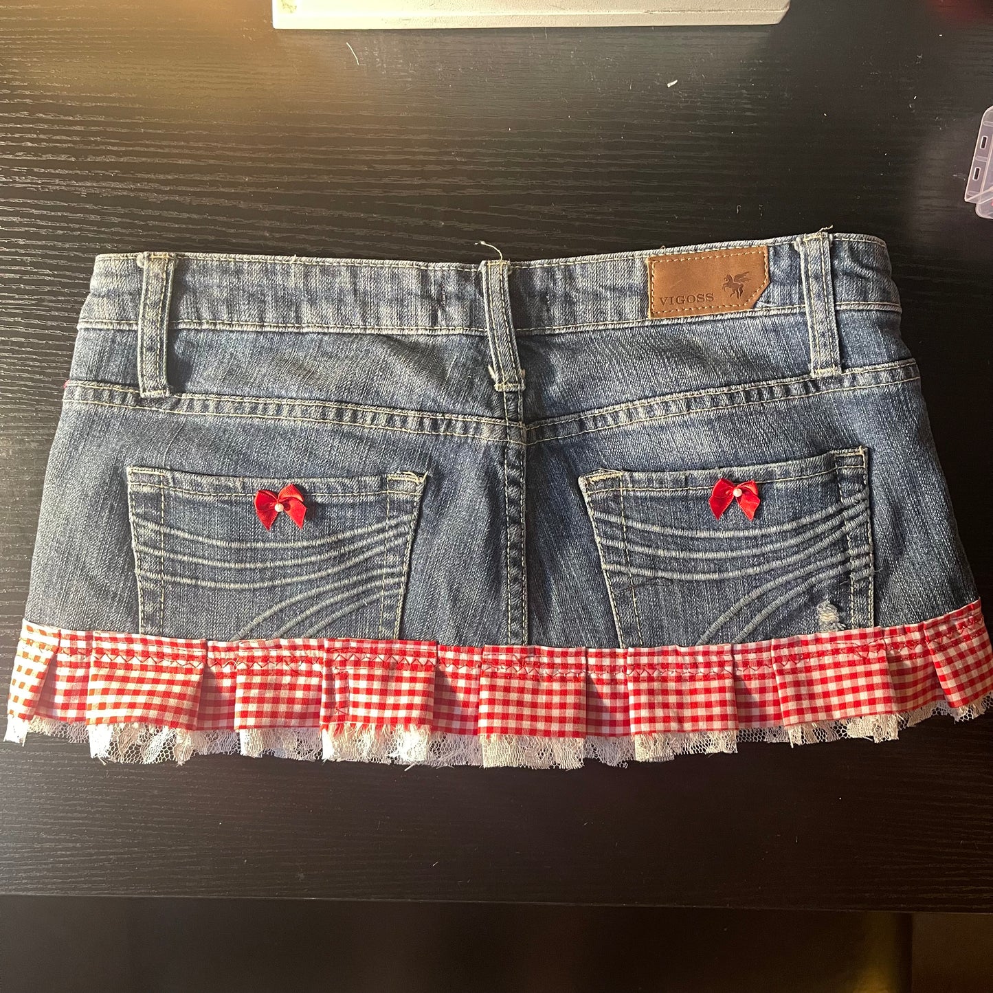 ୨୧ reworked OOAK y2k vintage mini denim skirt with red gingham pleats with lace trim, lace & bows