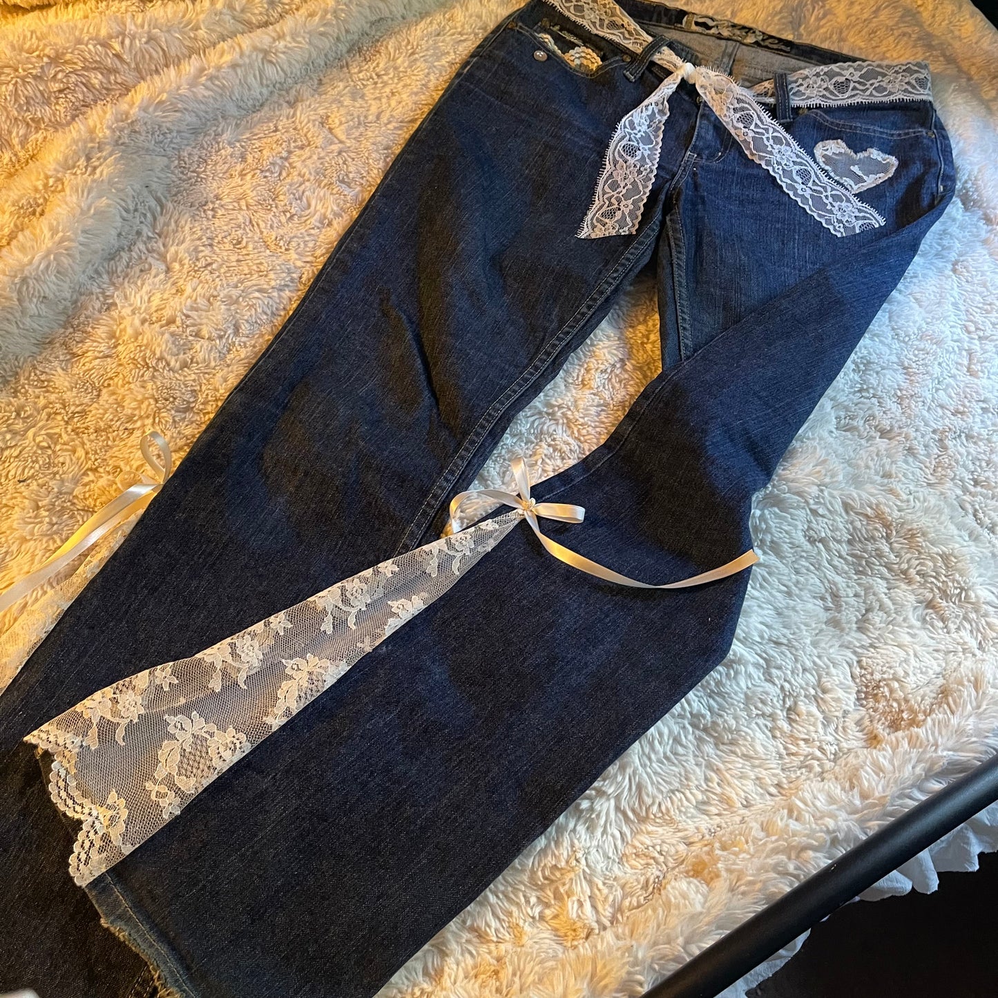 ୨୧ reworked y2k princess OOAK white ribbon flare jeans with contrast stitching, heart patch, lace panels + bows