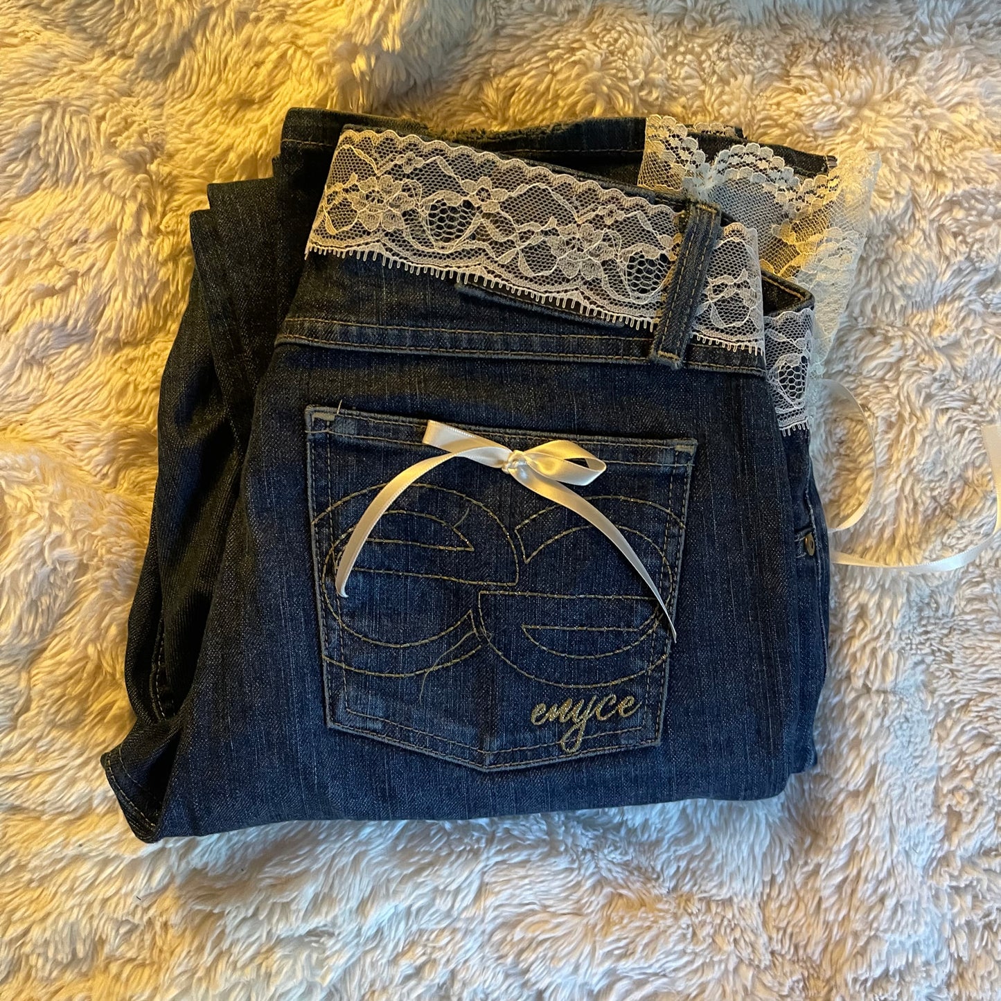 ୨୧ reworked y2k princess OOAK white ribbon flare jeans with contrast stitching, heart patch, lace panels + bows