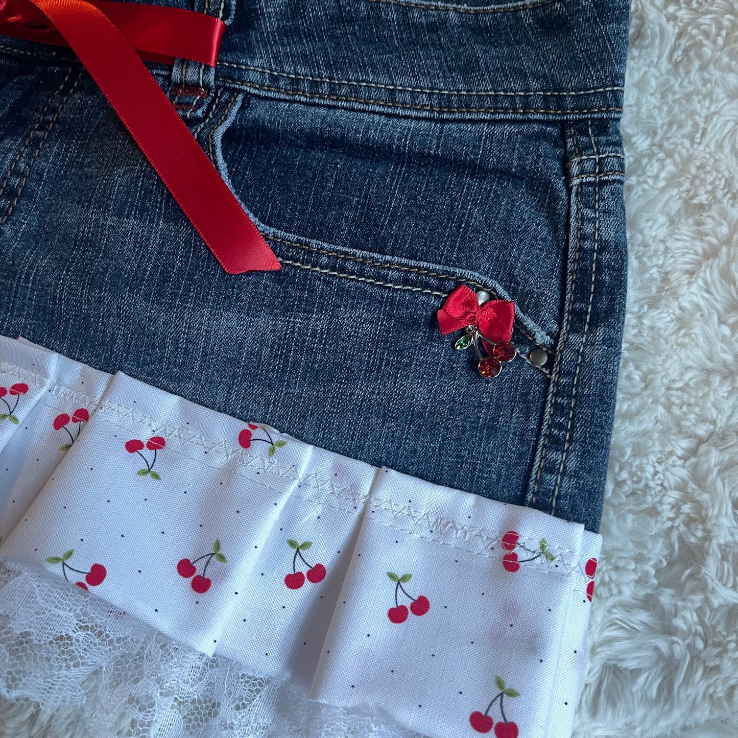 ୨୧ reworked OOAK y2k cherry bomb princess vintage mini denim skirt cherry charm, lace trim, lace & bows