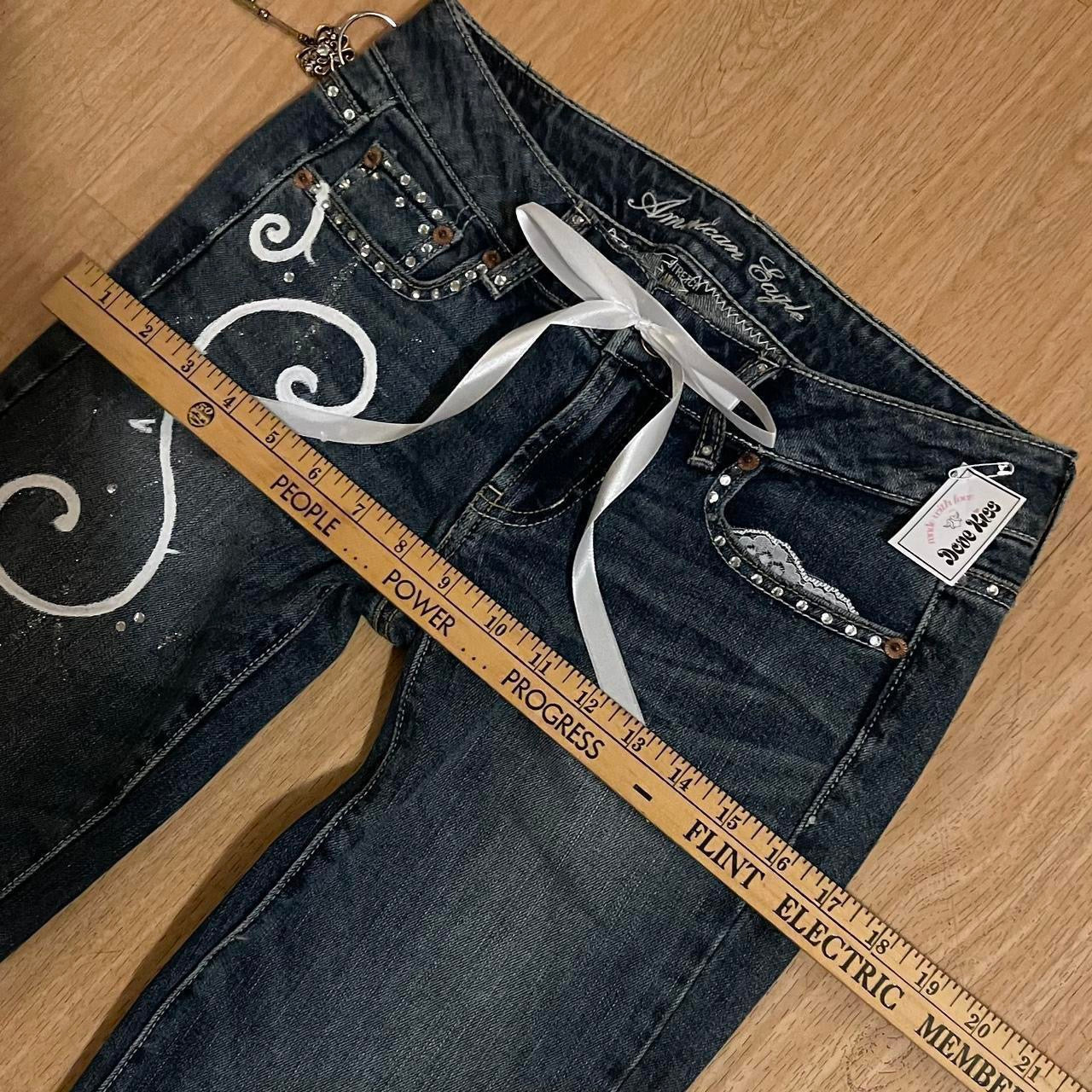 ୨୧ reworked y2k “Valia” by Dove Kiss OOAK white ribbon flare jeans