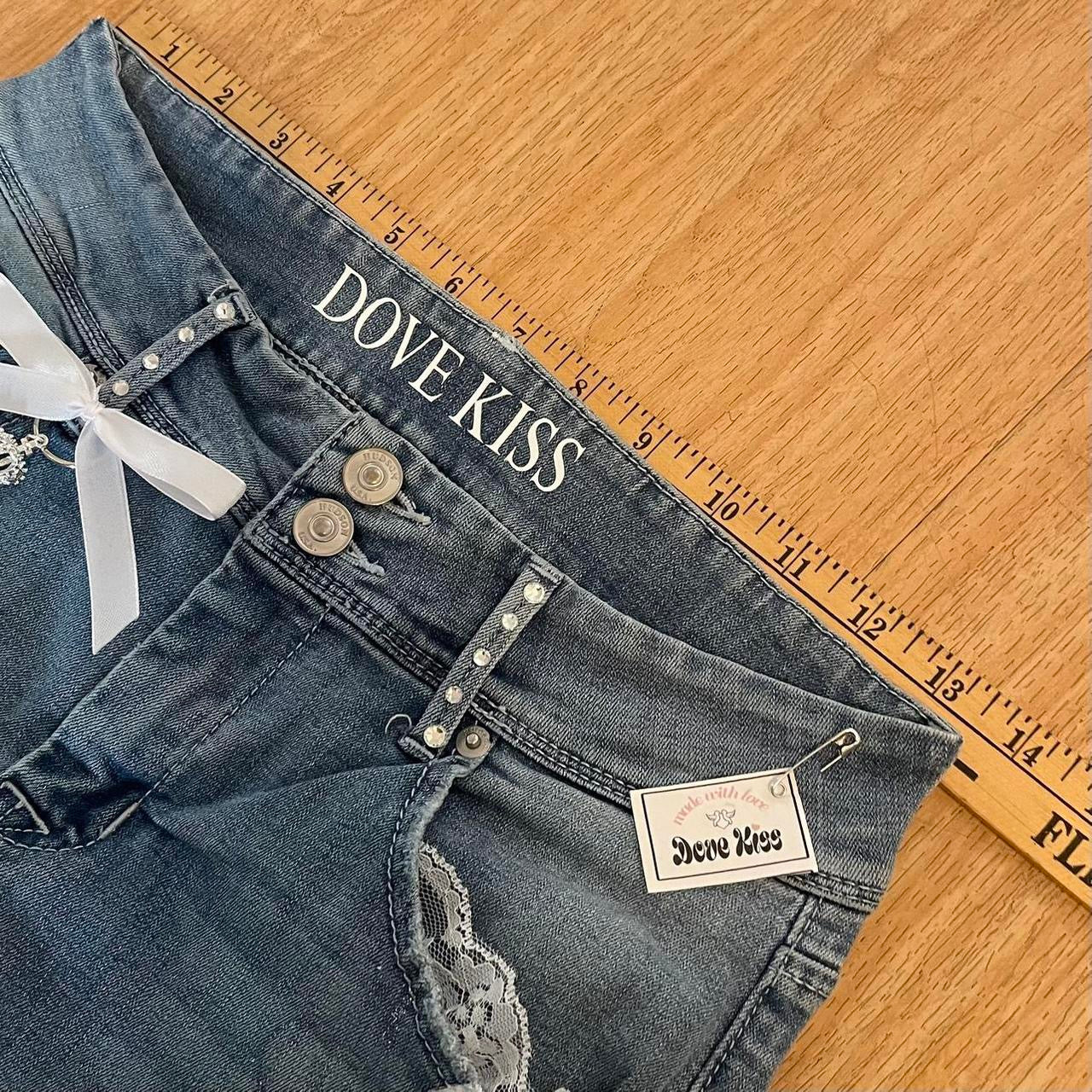 ୨୧ “𝑽𝒂𝒍𝒊𝒂” by Dove Kiss 2000s OOAK white ribbon flare jeans