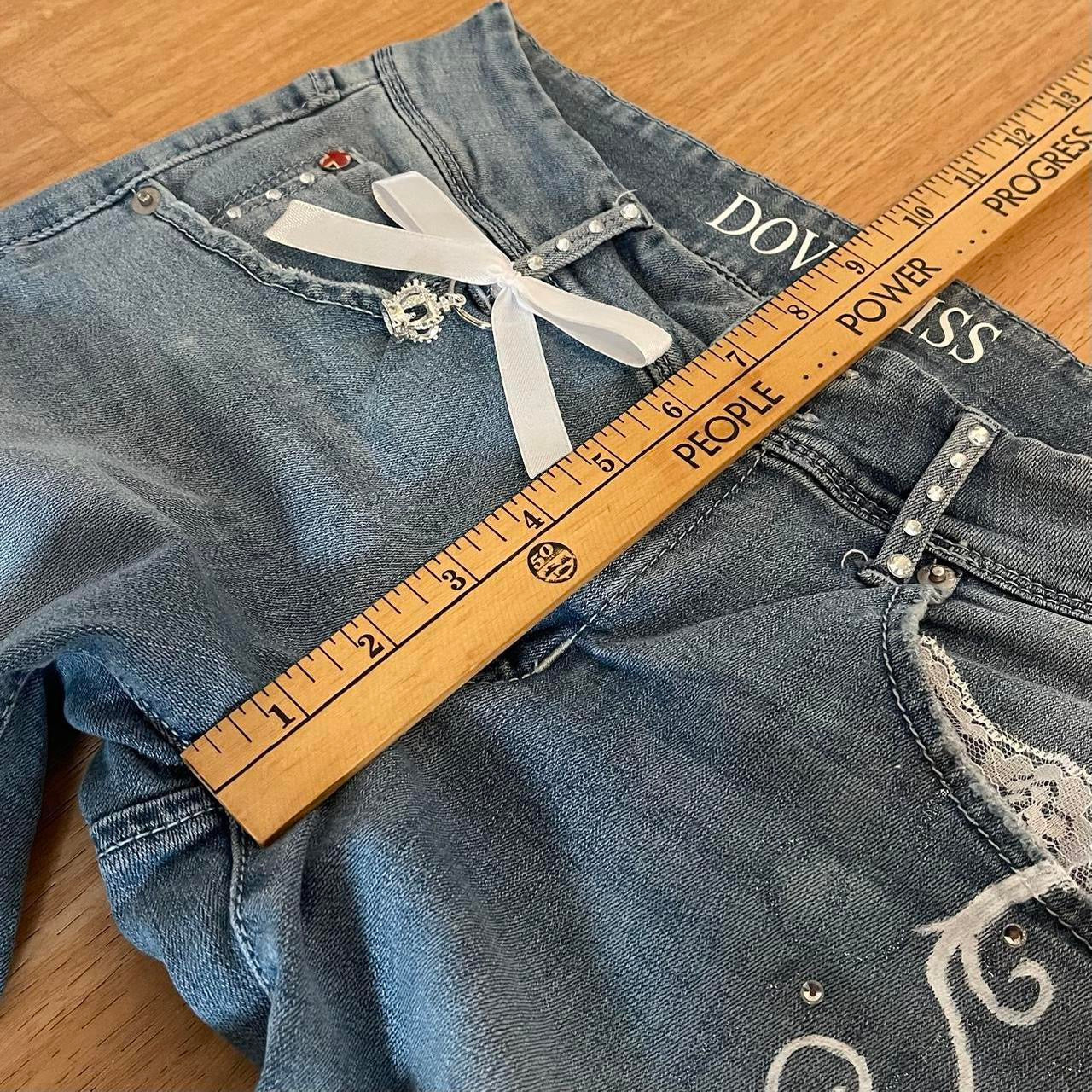୨୧ “𝑽𝒂𝒍𝒊𝒂” by Dove Kiss 2000s OOAK white ribbon flare jeans