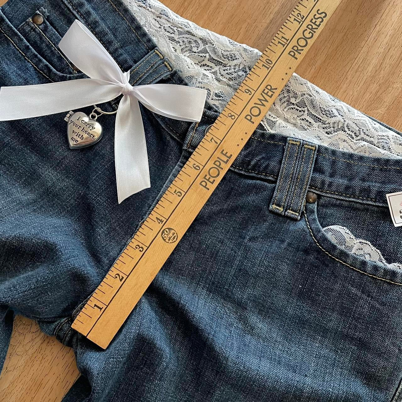 𓏲ּ𝄢 𝐃𝐎𝐕𝐄 𝐊𝐈𝐒𝐒 “doe hearts” 2000s princess ribbon ultra flare jeans