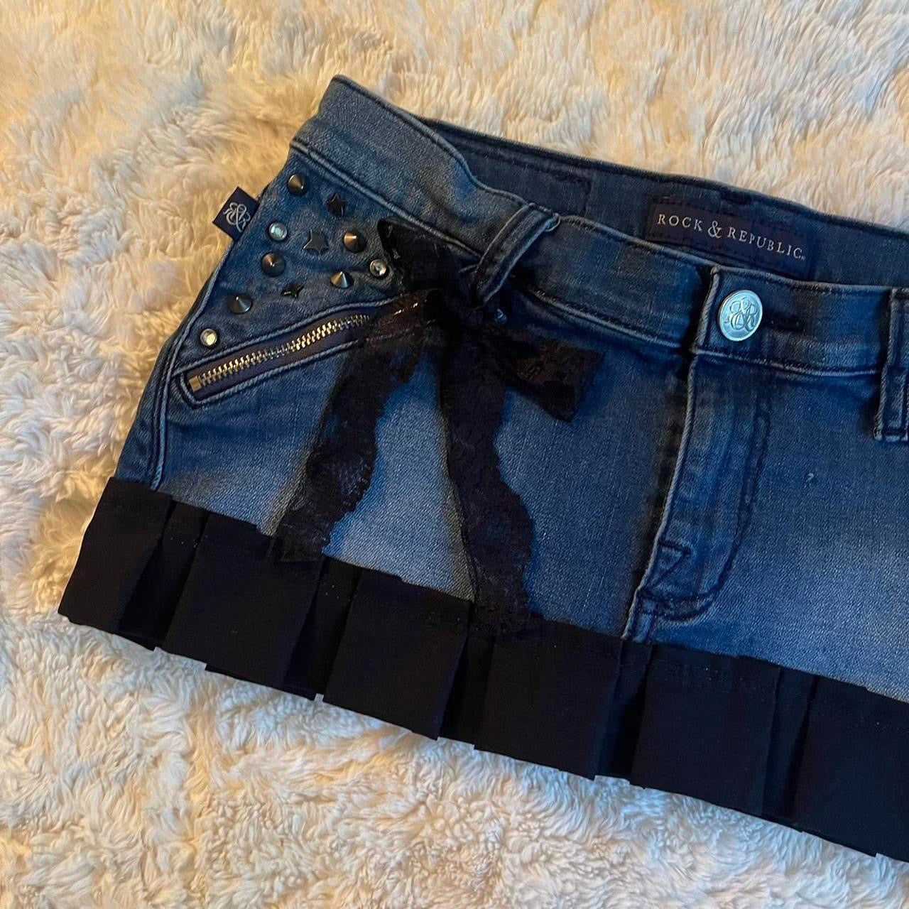 reworked OOAK 2000s princess light wash denim micro mini skirt w rhinestones, spiked studs, zipper pockets, black ribbon, lace and hand sewn pleats ୨୧
