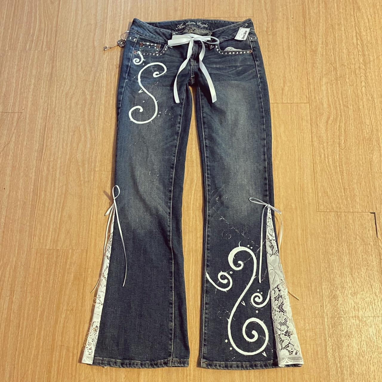 ୨୧ reworked y2k “Valia” by Dove Kiss OOAK white ribbon flare jeans