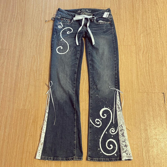 ୨୧ reworked y2k “Valia” by Dove Kiss OOAK white ribbon flare jeans