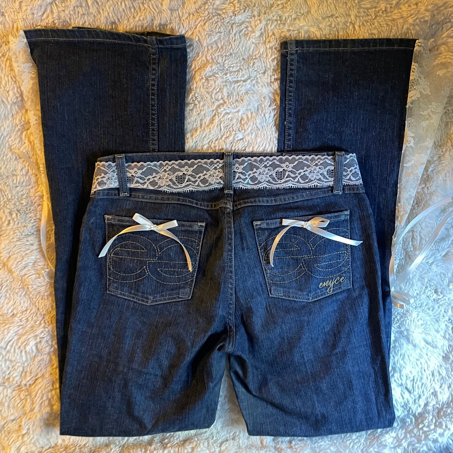 ୨୧ reworked y2k princess OOAK white ribbon flare jeans with contrast stitching, heart patch, lace panels + bows