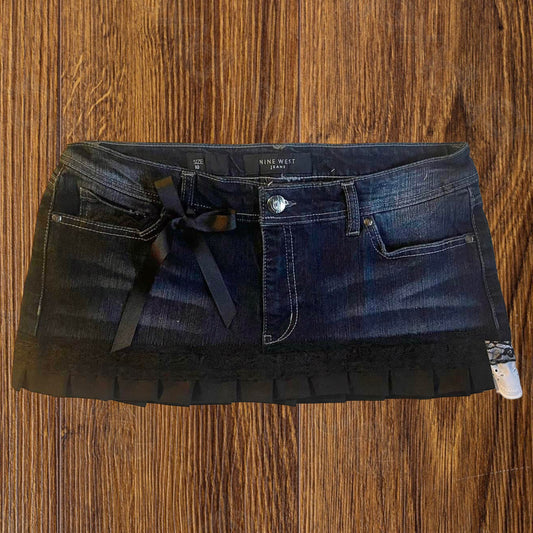 reworked OOAK 2000s princess dark wash denim micro mini skirt w black ribbon, lace and hand sewn pleats ୨୧
