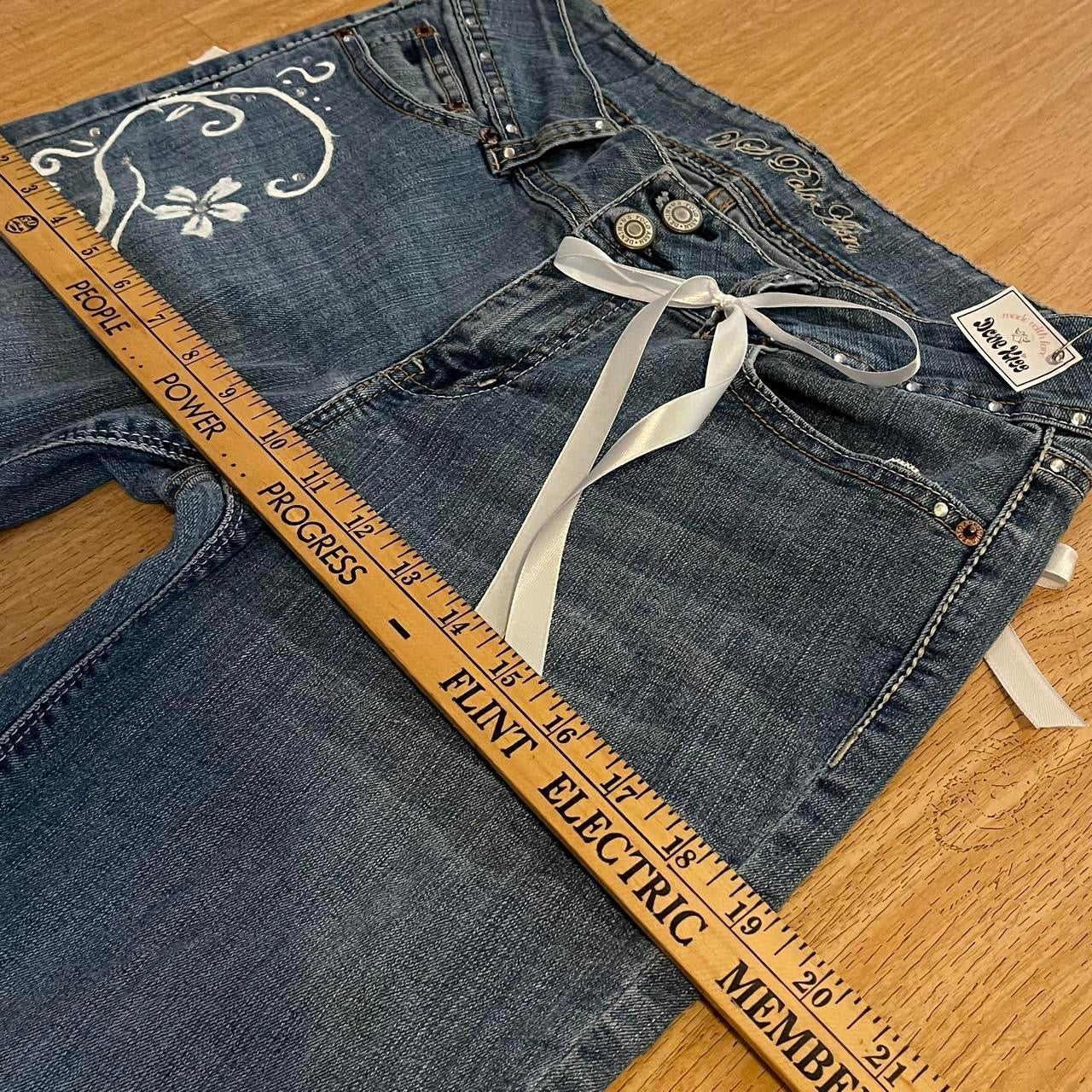 ୨୧ reworked y2k “Valia” by Dove Kiss OOAK white ribbon flare jeans