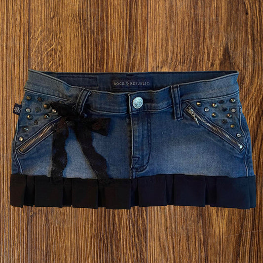 reworked OOAK 2000s princess light wash denim micro mini skirt w rhinestones, spiked studs, zipper pockets, black ribbon, lace and hand sewn pleats ୨୧